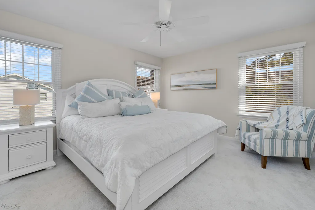 Indulge in luxury and comfort in our master bedroom featuring a king-sized bed