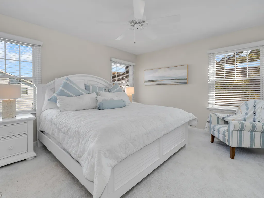 Indulge in luxury and comfort in our master bedroom featuring a king-sized bed