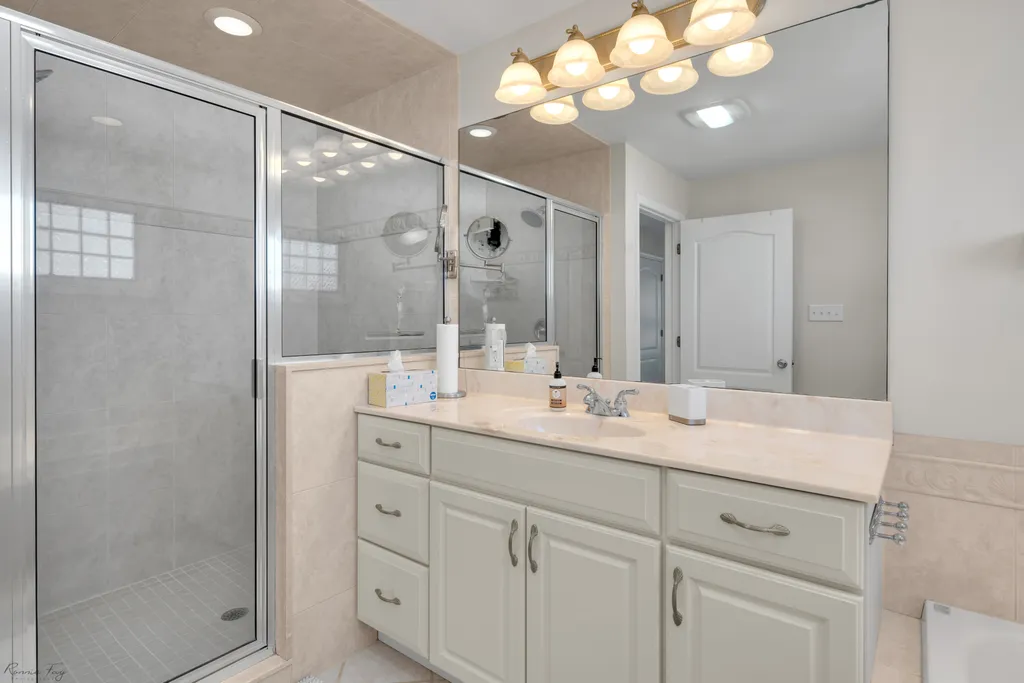 Pamper yourself in our master bathroom with a refreshing shower. Unwind and rejuvenate in a private oasis, adding a touch of luxury to your stay