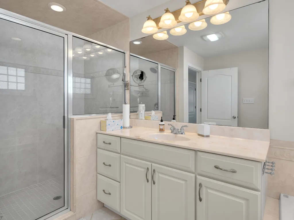 Pamper yourself in our master bathroom with a refreshing shower. Unwind and rejuvenate in a private oasis, adding a touch of luxury to your stay