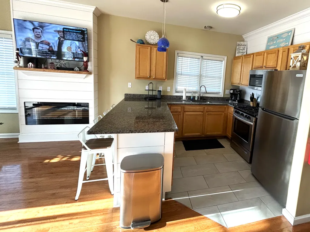 K - new tile, appliances, lights. Shiplap island