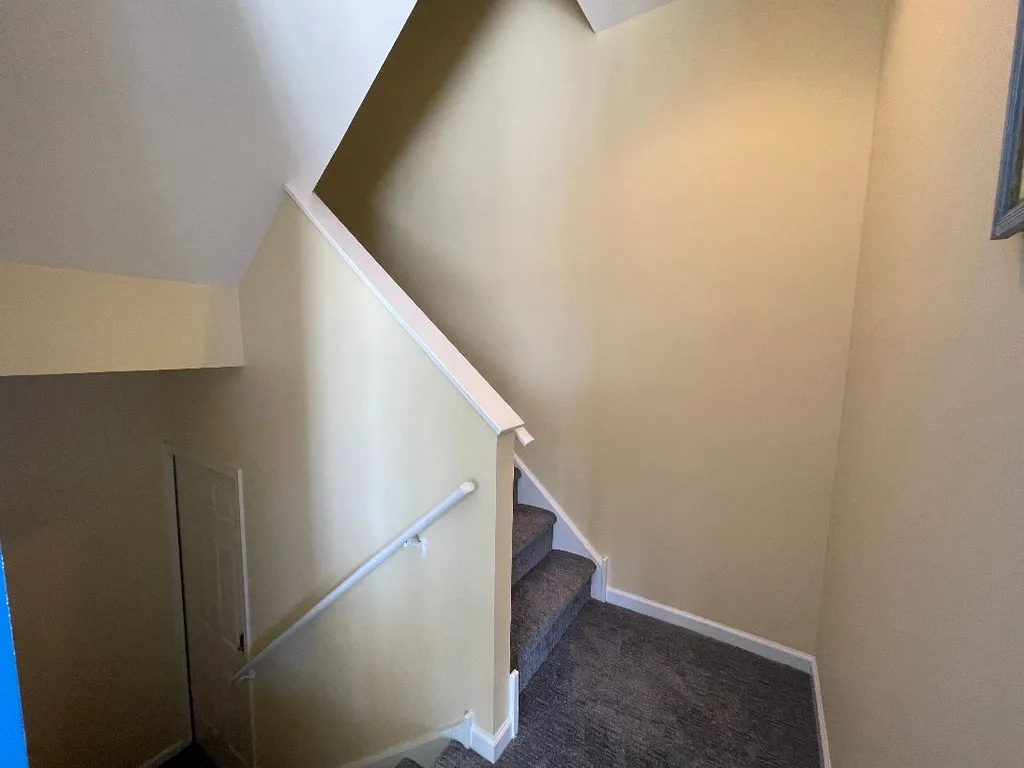 Entry and Stairs to Master Bedroom