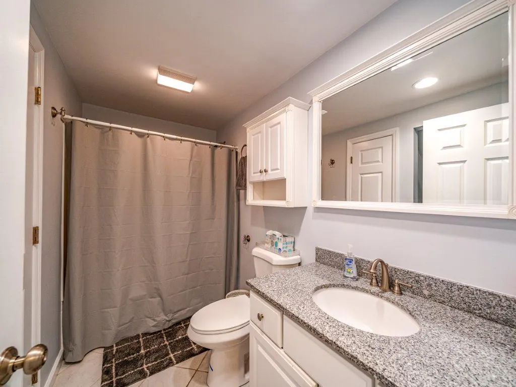 Hall Bathroom-Stack Wash/Dryer