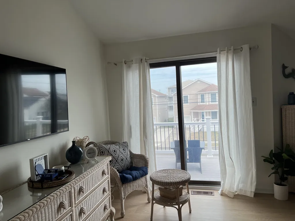 Master bedroom with upper deck off bedroom