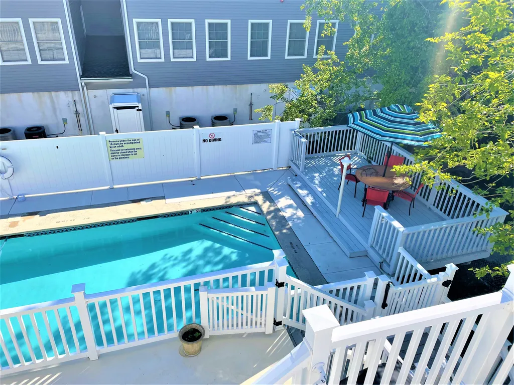 pool with lounges/umbrellas