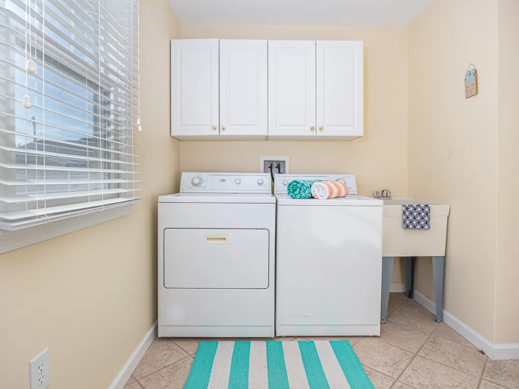 Fully equipped laundry room.
