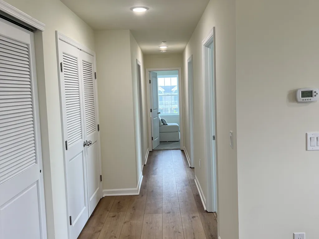 Hallway leading to the bedrooms and bathrooms. 