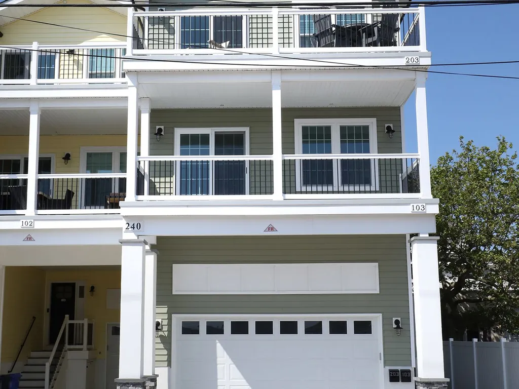 Top Floor Condo with shared garage (2 total parking spaces one inside and one outside) 