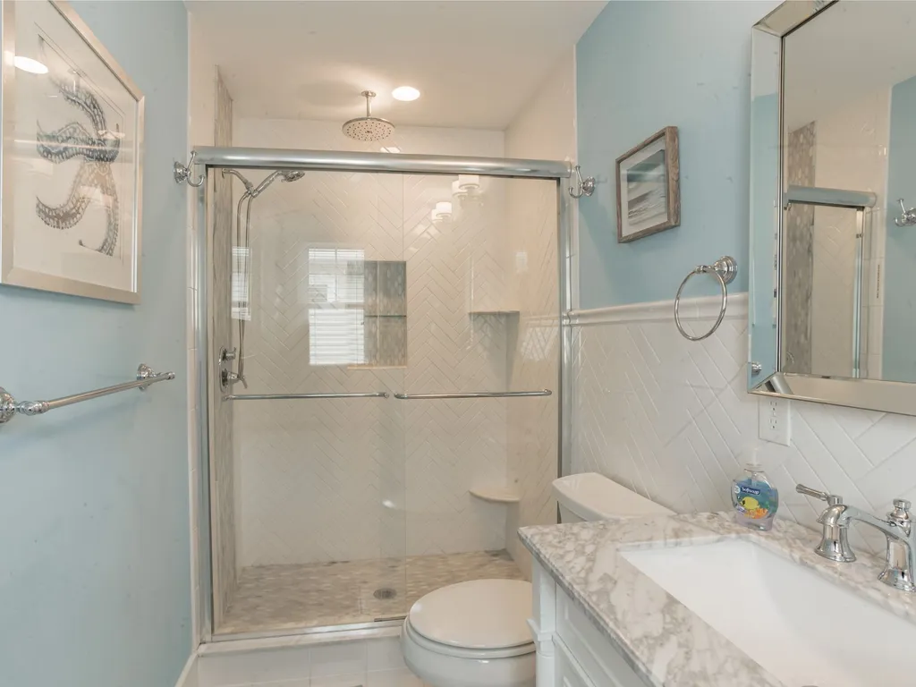 Master bedroom 1 ensuite w/ marble top  double sink with rain shower