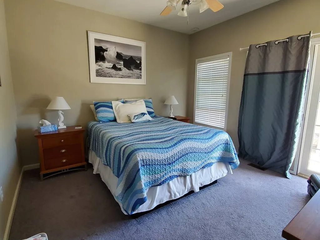 Master Bedroom with back balcony access.