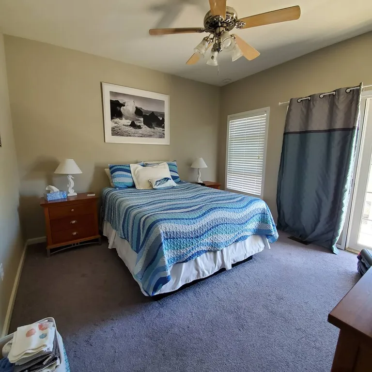 Master Bedroom with back balcony access.