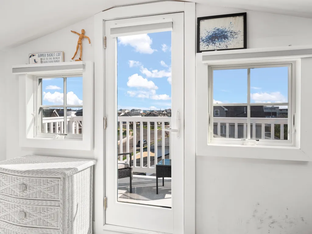 Deck off the top floor with a little ocean view and lake Louise views