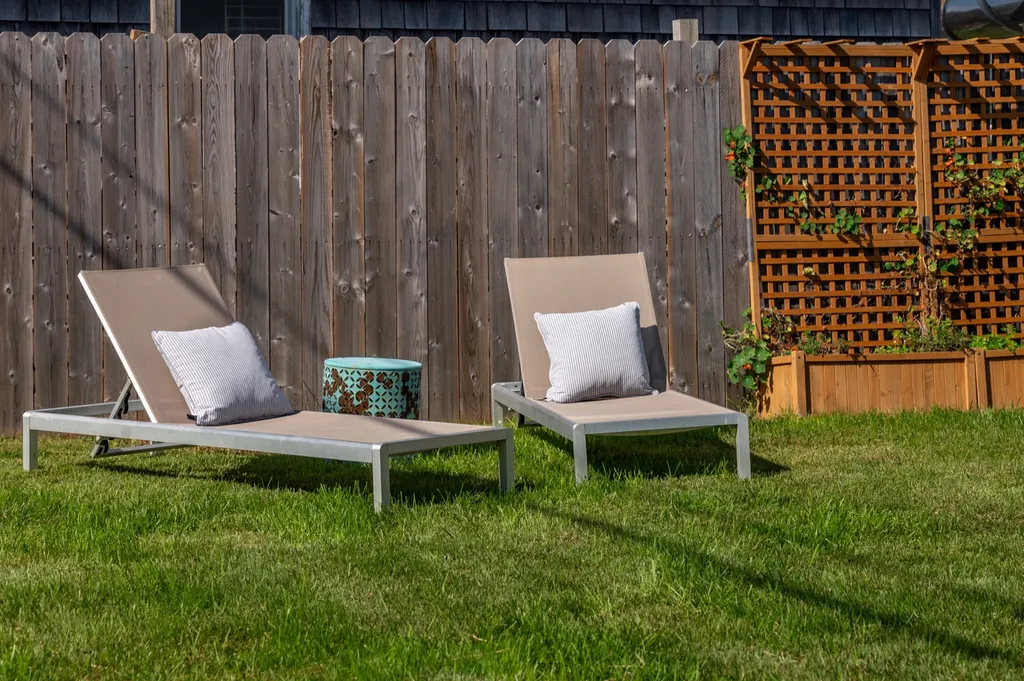 Large grassy backyard area