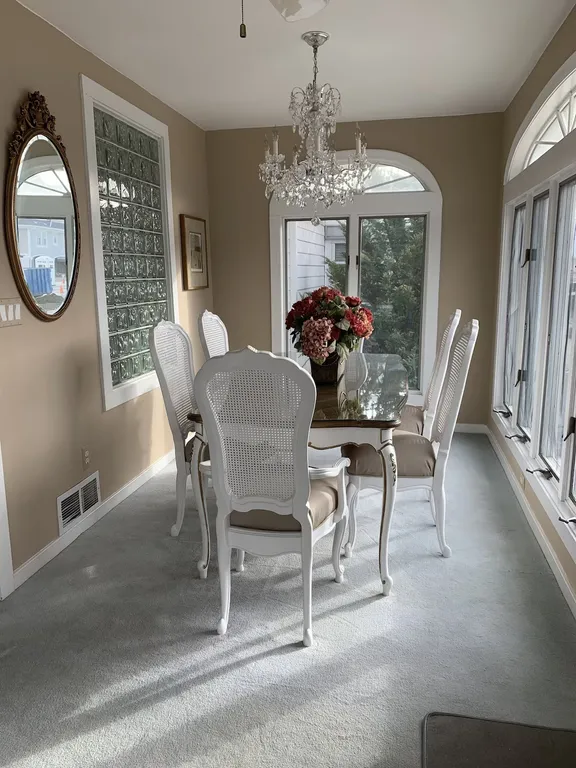 Gorgeous dining room with crystal chandelier 