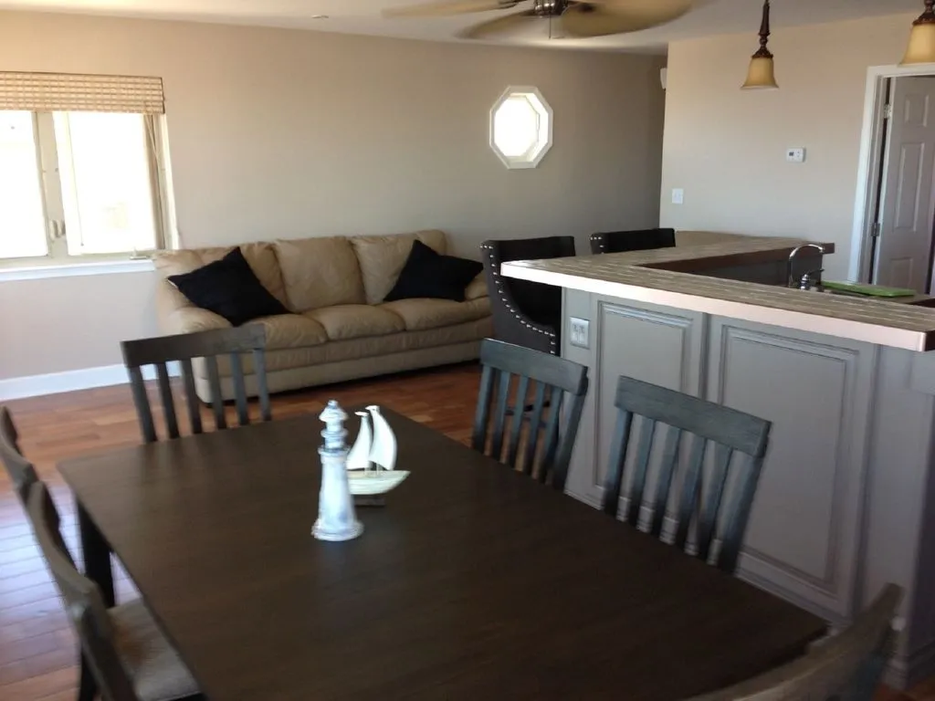 Kitchen, Dining and Seating Area in Front of Condo
