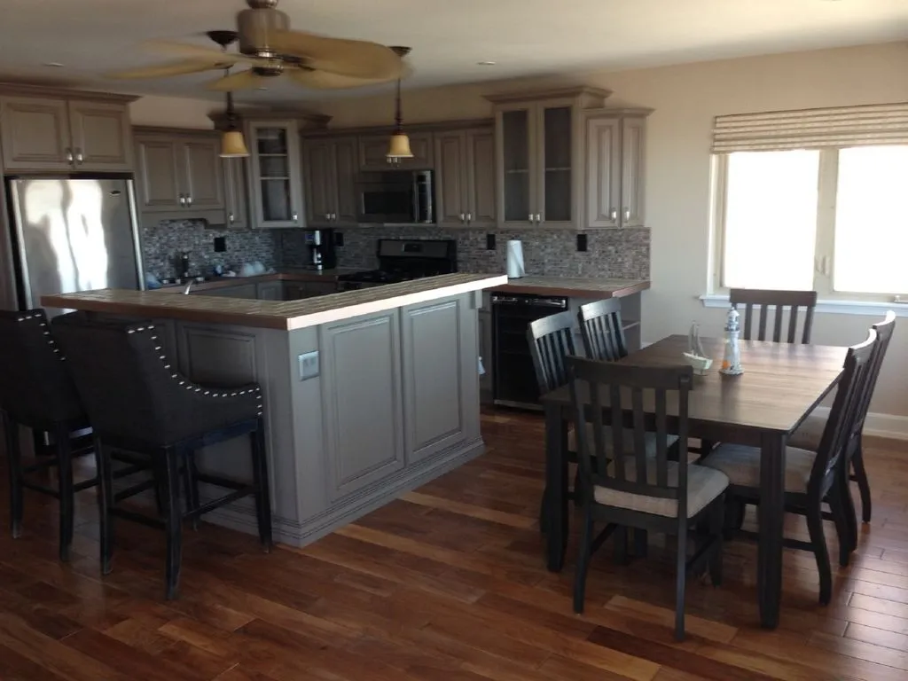 Kitchen and Dining Area in Front of Condo
