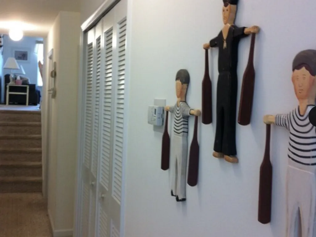 Hall leading to 3 bedrooms