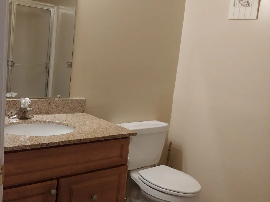 Downstairs full bath with stall shower.