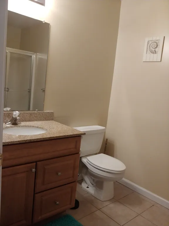 Downstairs full bath with stall shower.