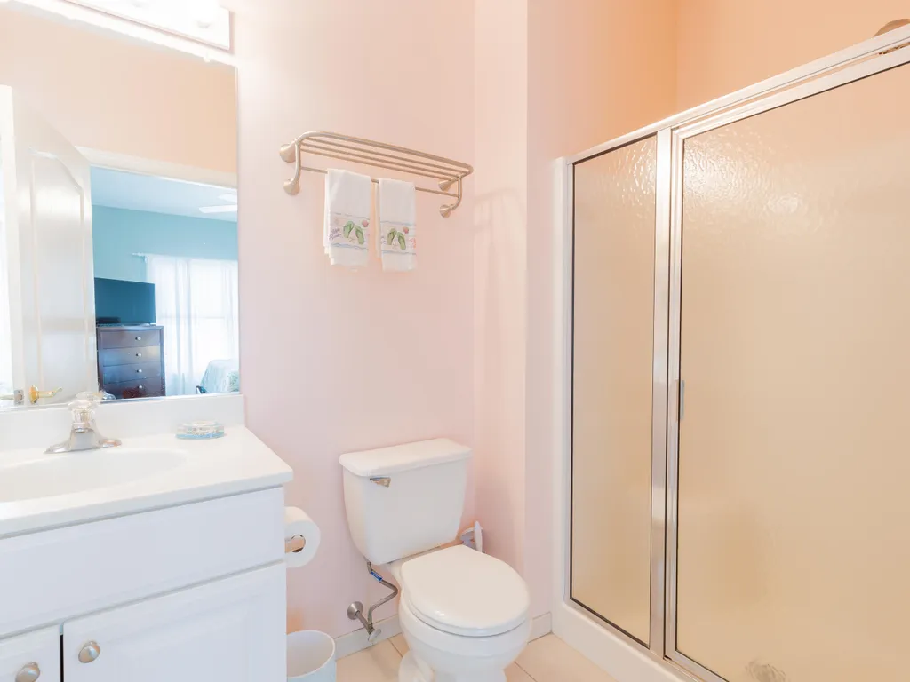 En suite bathroom for primary bedroom