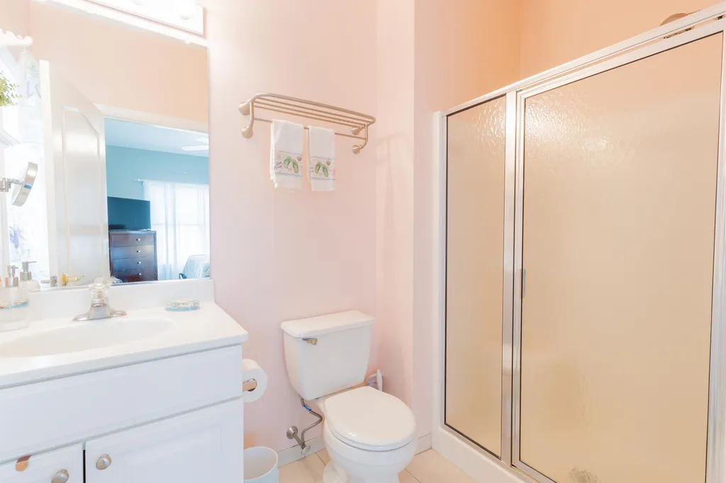 En suite bathroom for primary bedroom