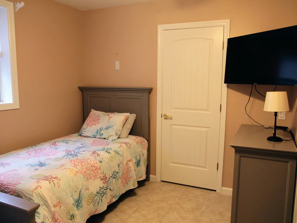 1st floor bedroom - 2 twin beds and twin trundle bed
