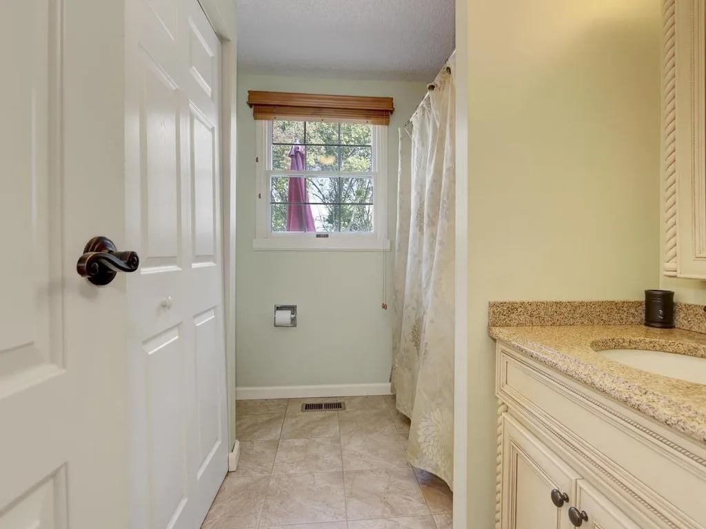 Downstairs Full Bath/Laundry Room