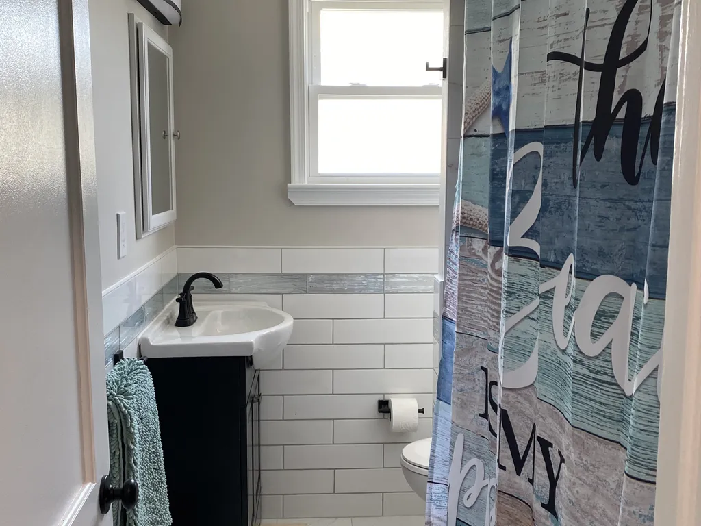 Bathroom with shower and tub