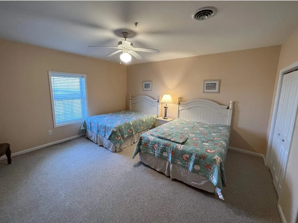 2nd floor bedroom with 2 queen beds