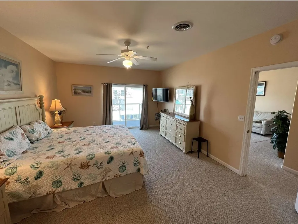 Master suite with sliders to upper deck