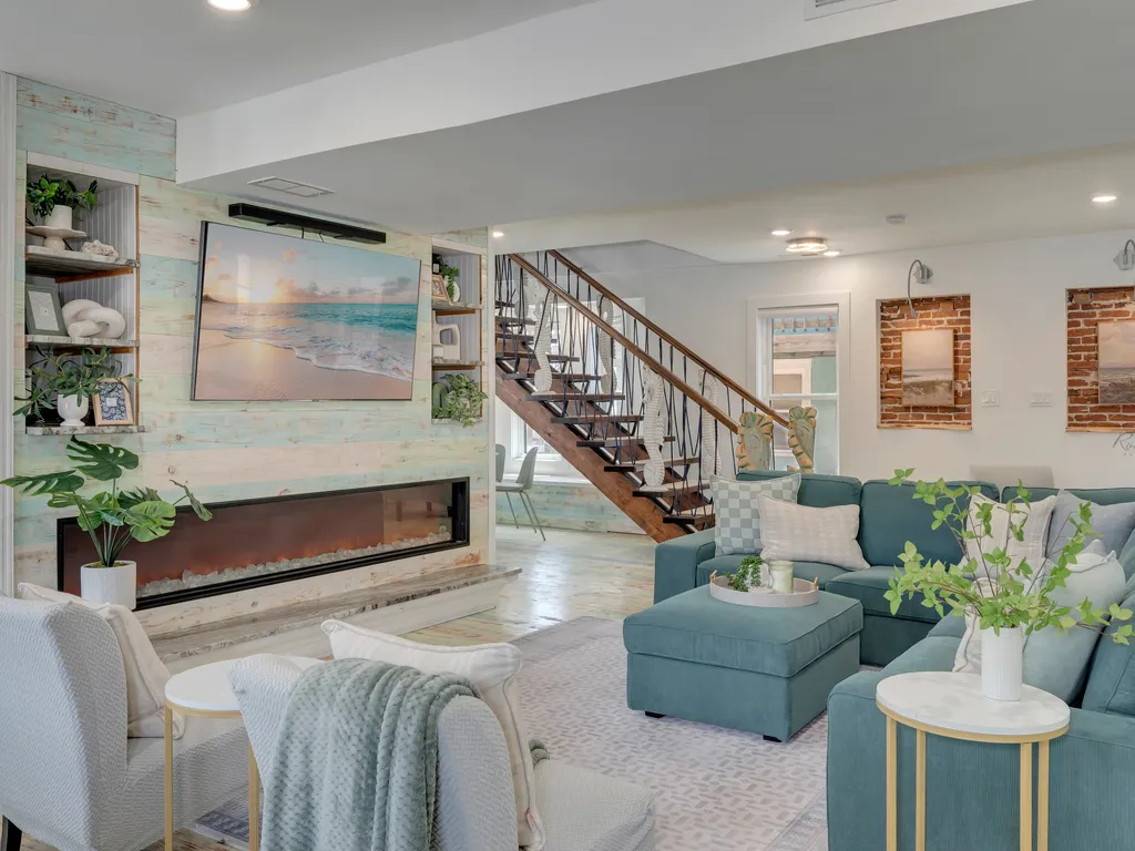 Back in the living room with stairs to second floor