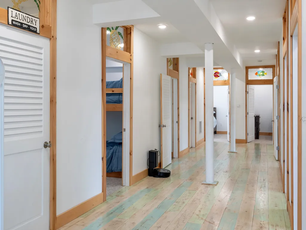 Alternate view of second floor hallway with 7 bedrooms