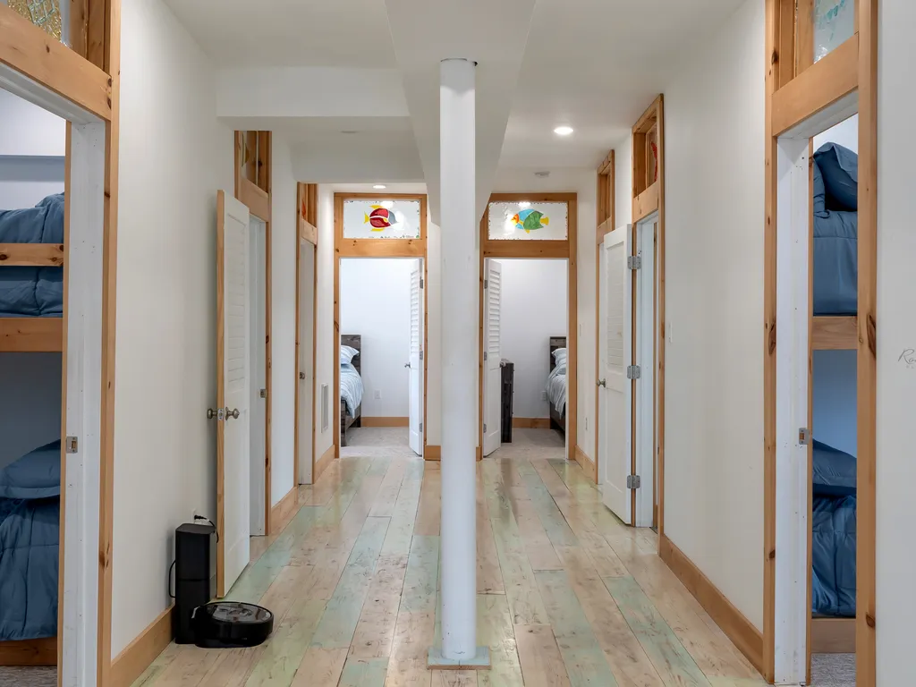Second floor hallway to 7 bedrooms