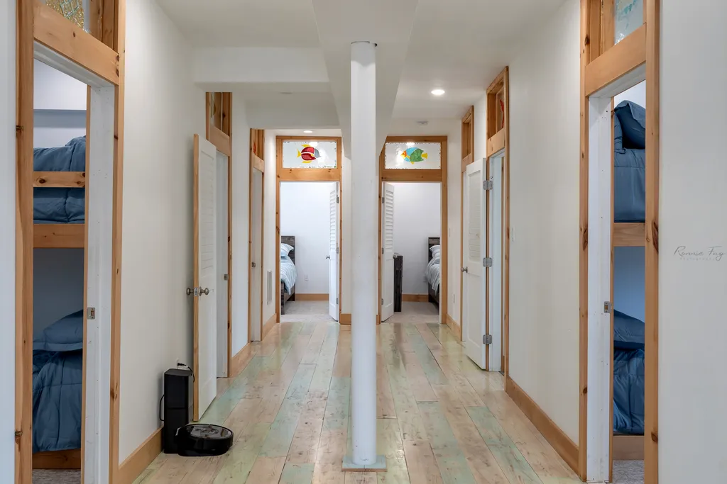 Second floor hallway to 7 bedrooms