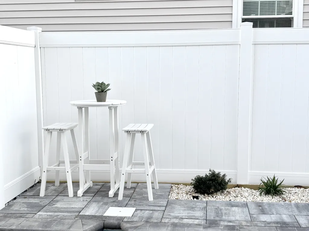 pub table and seating by pool