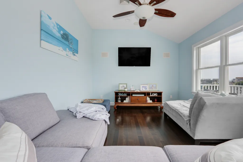 living room/open to kitchen and 3rd floor deck