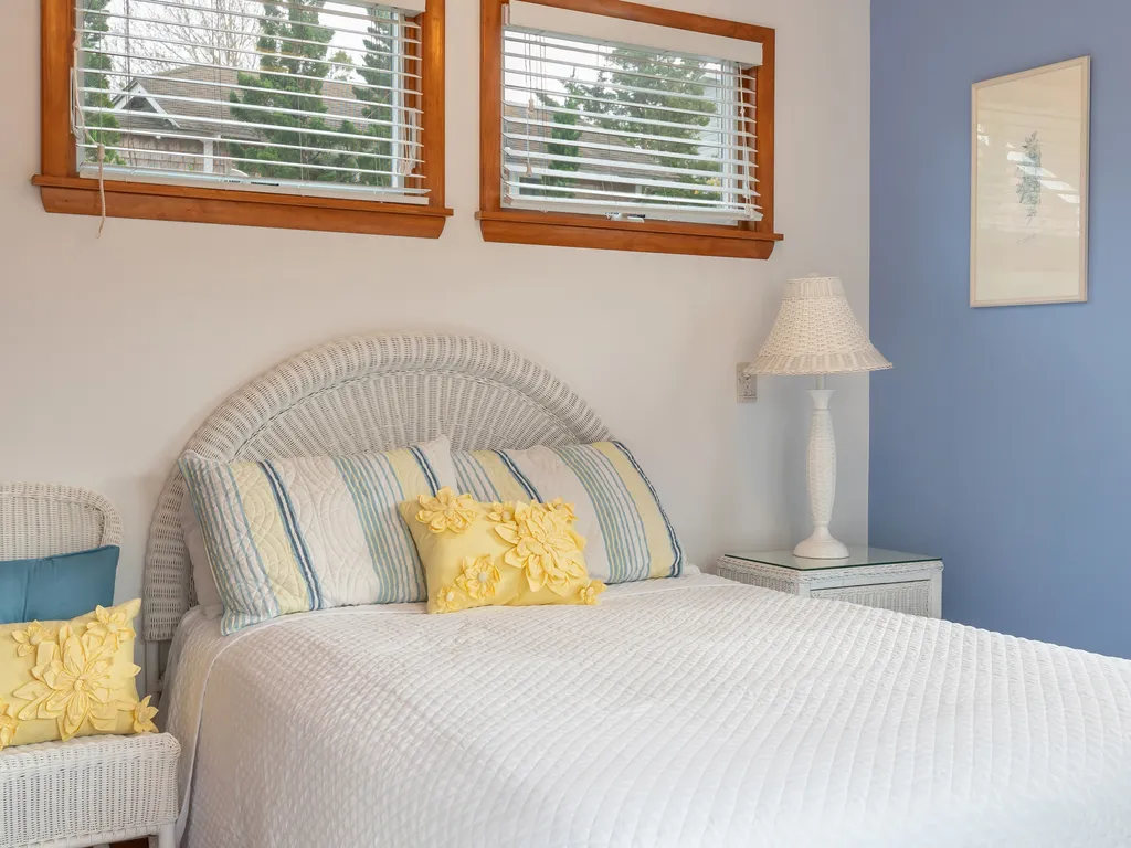 Full bed in this light and airy back bedroom