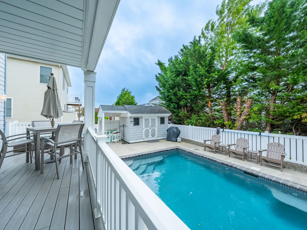 Relax and unwind by the private heated pool