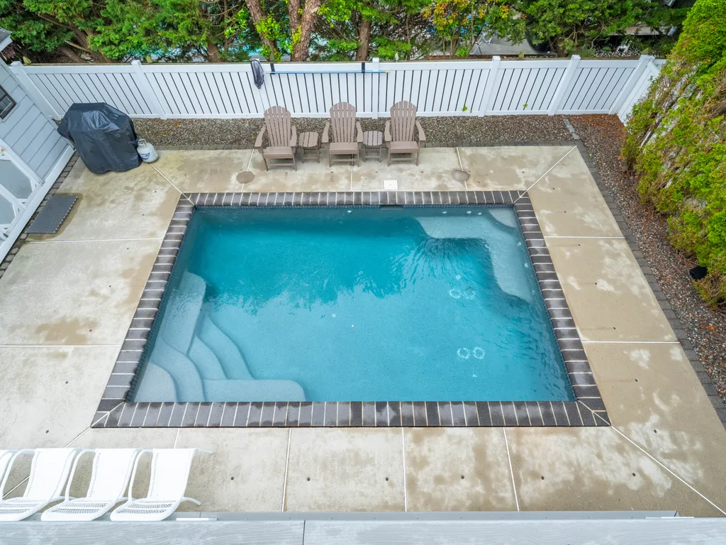Relax and unwind by the private heated pool