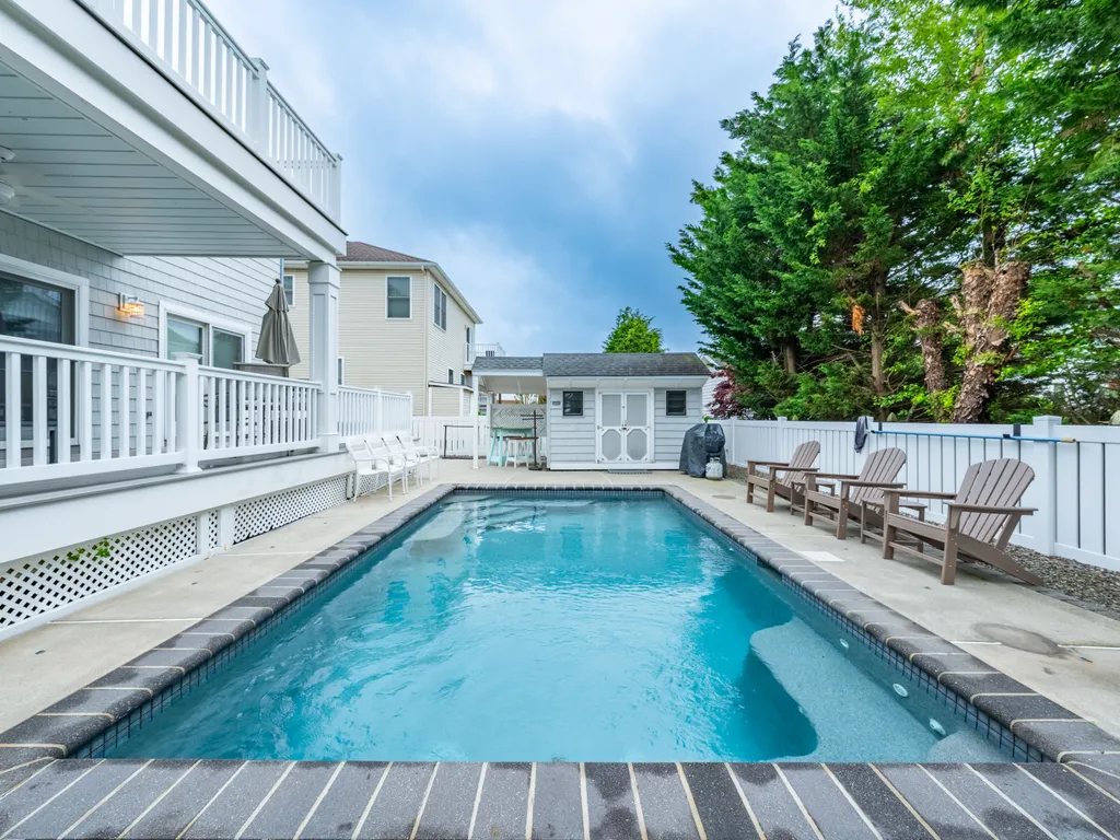Relax and unwind by the private heated pool