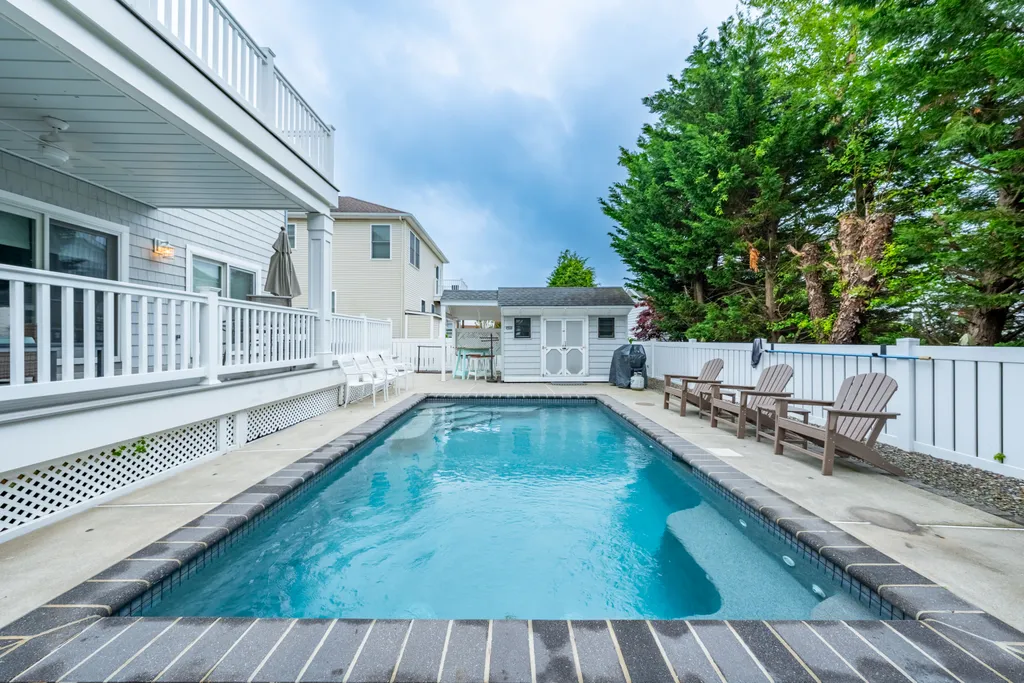 Relax and unwind by the private heated pool