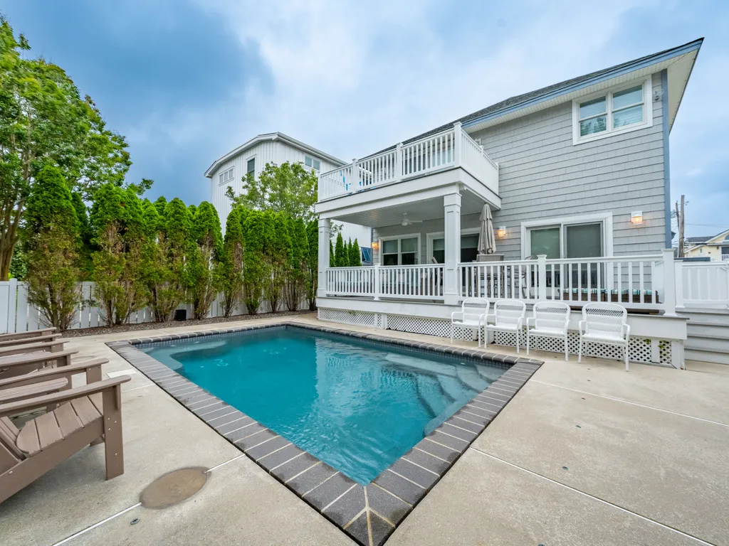 Relax and unwind by the private heated pool