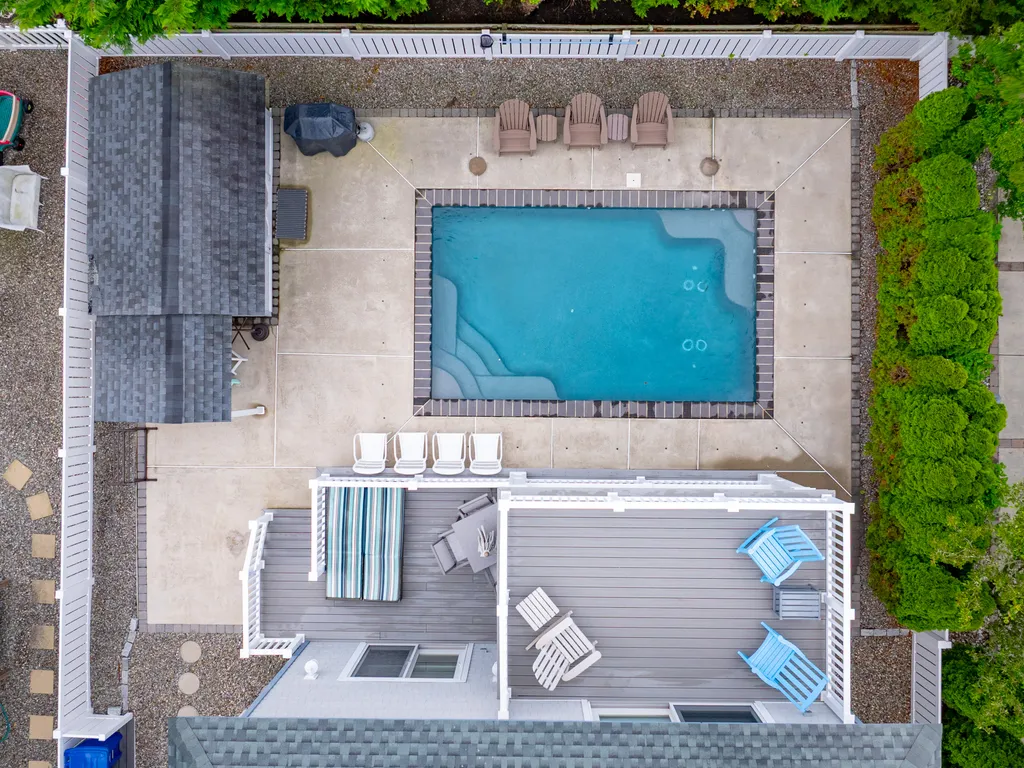 Relax and unwind by the private heated pool