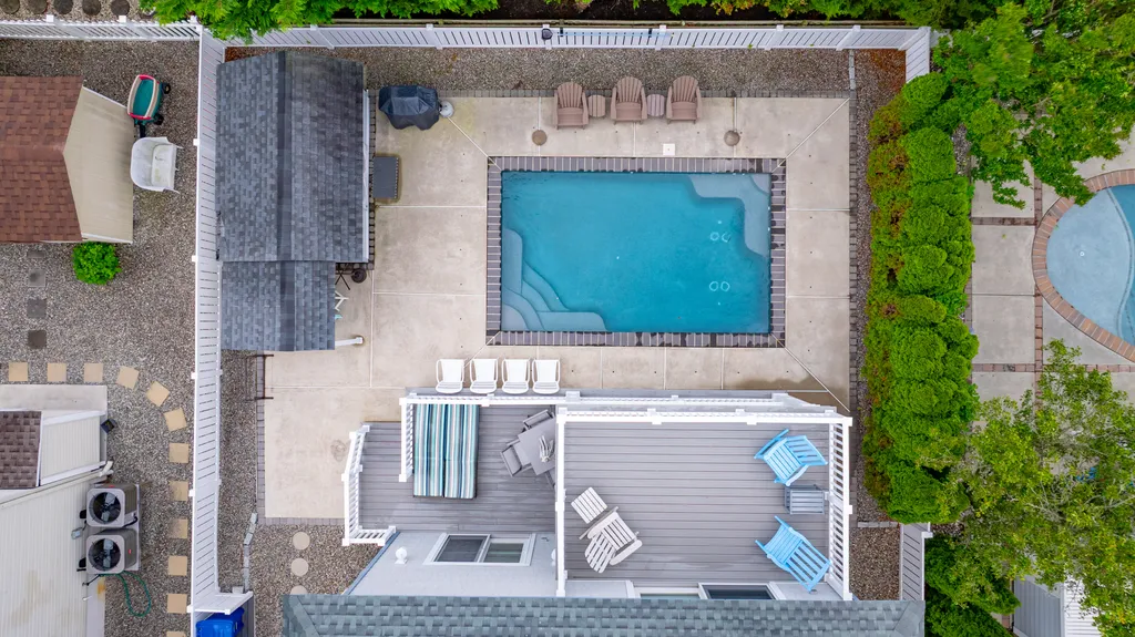 Relax and unwind by the private heated pool