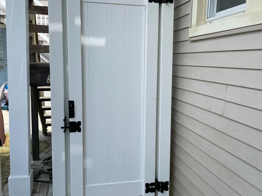 Enclosed outdoor shower.