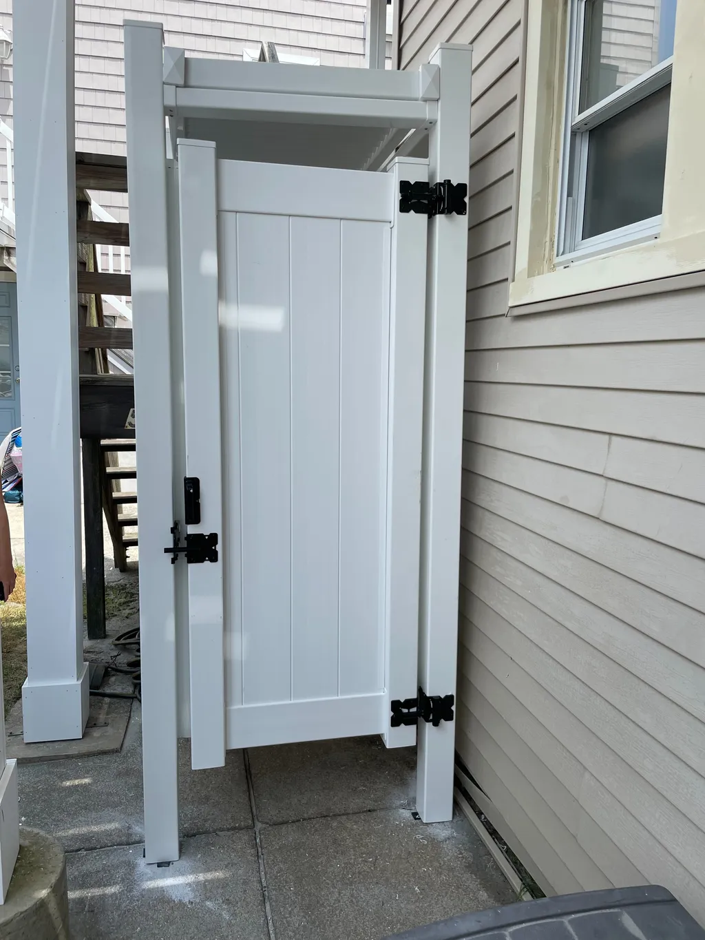 Enclosed outdoor shower.