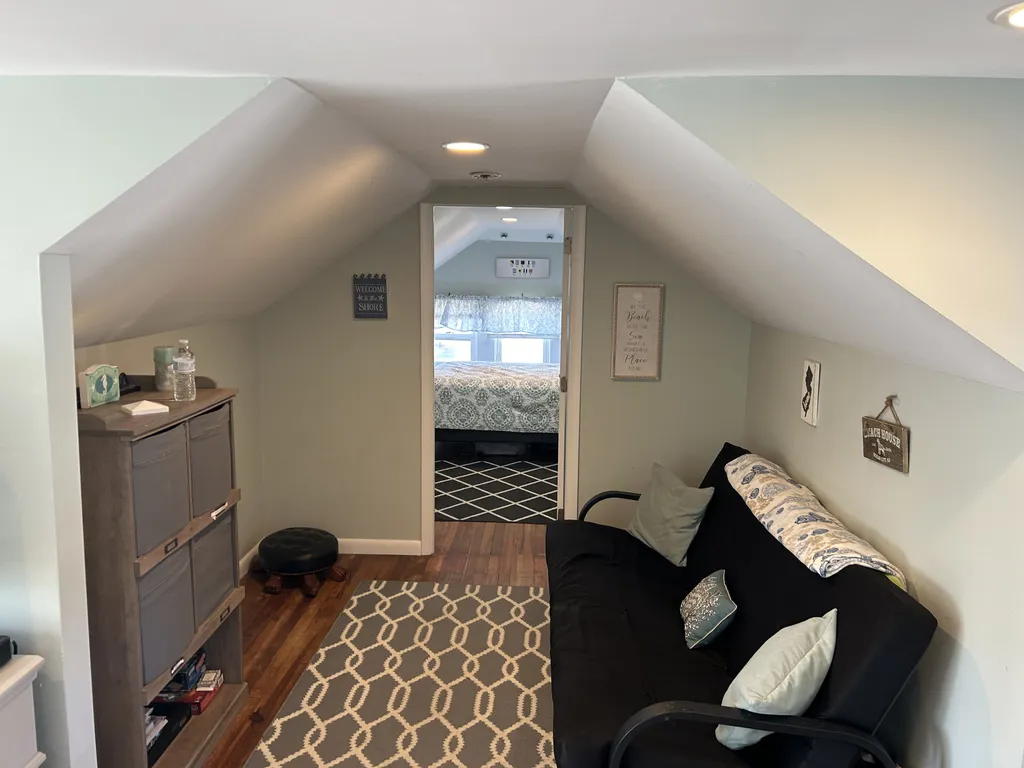 Futon nook with games and books.