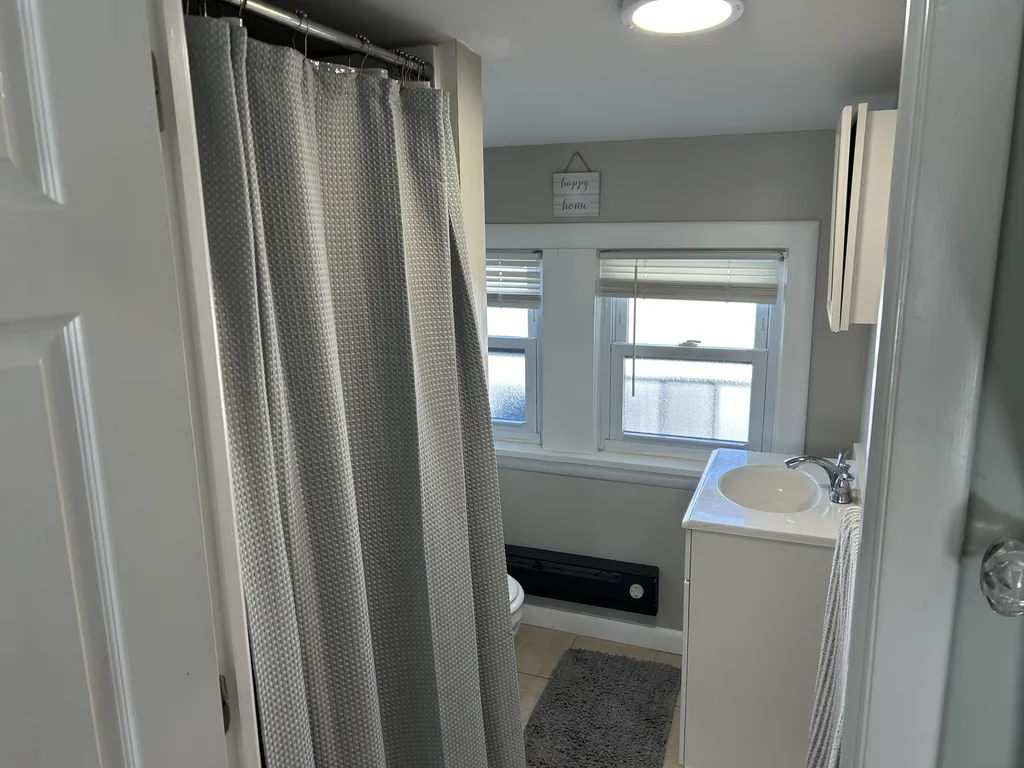 Bathroom with updated shower.