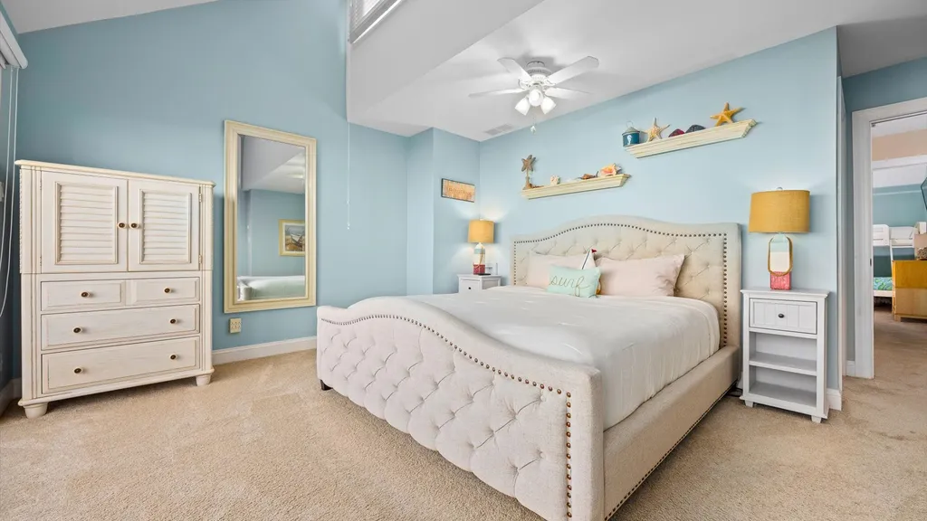 King master bedroom with private bathroom and balcony on top level