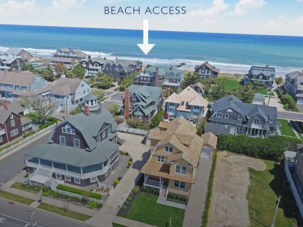 Steps from secluded Chadwick Street beach access. Beach side of Main 